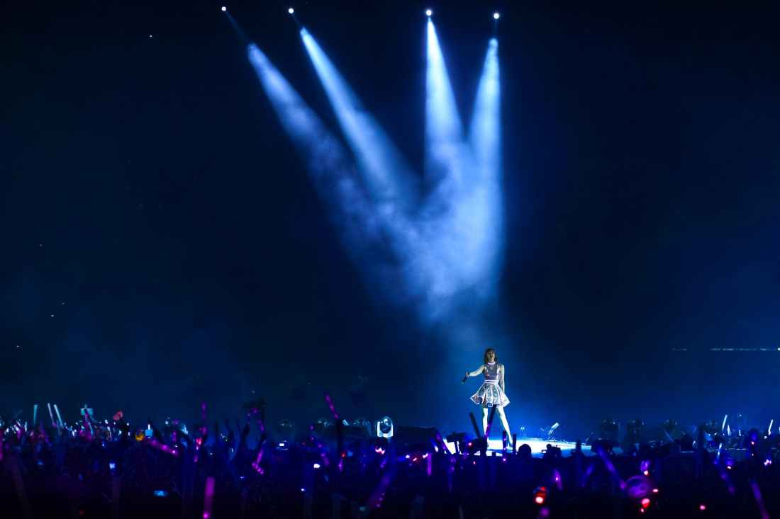 woman performing at stage