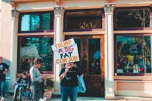 person holding placard